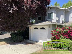 Eagle Point apartment for rent - A house with a white garage door is for sale.