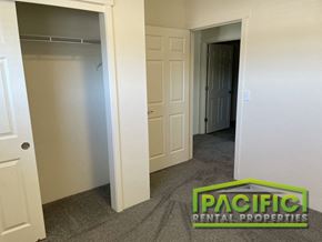 Medford apartment for rent - a bedroom with a closet and a rug on the floor
