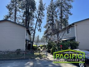 Phoenix apartment for rent - a house with tall trees next to it