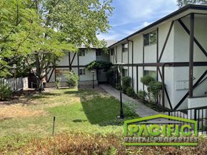 Ashland apartment for rent - a home with a yard in front of a building