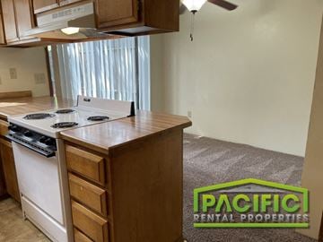 Ashland apartment for rent - a kitchen with a stove and a counter top in a house