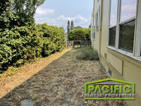 Ashland apartment for rent - a yard with a dirt path next to a house