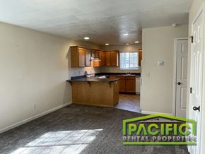 Medford apartment for rent - A kitchen area with a counter and cabinets is shown in the image.