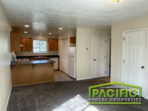 Medford apartment for rent - A kitchen with a washer and dryer built in.
