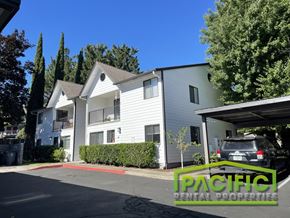 Ashland apartment for rent - A building with the words "Pacific Rental Properties" on the bottom right corner.