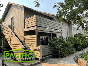 Medford apartment for rent - the exterior of a wooden house with stairs