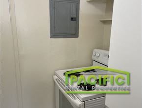 Ashland apartment for rent - a small laundry room with a washer and dryer