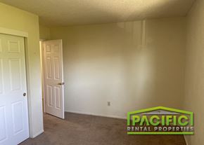 Ashland apartment for rent - the living room of an empty house with a white door