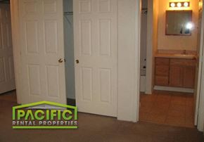 Medford apartment for rent - a bathroom with a closet and a white door