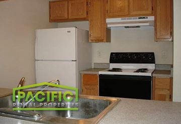 Medford apartment for rent - a kitchen with a sink and a refrigerator