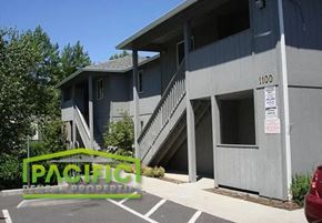 Medford apartment for rent - a building with stairs and a parking lot