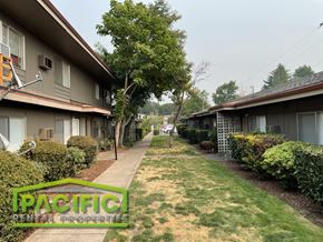 Medford apartment for rent - a sidewalk in front of a row of houses