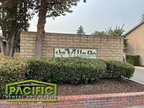 Medford apartment for rent - a brick wall with a sign for the village of the villa de