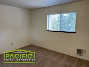 Medford apartment for rent - the interior of an empty living room with a window