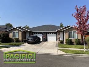 Central Point apartment for rent - a suburban house with a car parked in the driveway