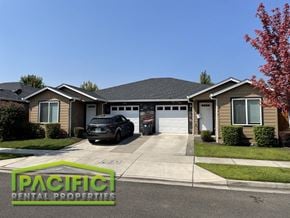 Central Point apartment for rent - a suburban house with a car parked in the driveway