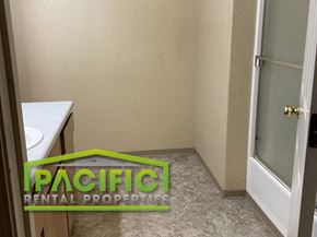 Medford apartment for rent - a small bathroom with a toilet and a glass shower