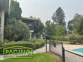 Medford apartment for rent - a house with a swimming pool and a fence