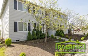 Central Point apartment for rent - a white house with a tree in front of it