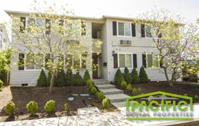 Central Point apartment for rent - the front of a white house with a garden and stairs