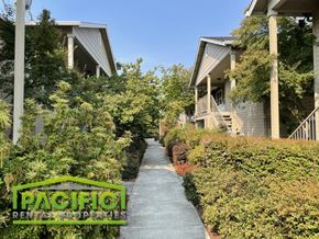 Medford apartment for rent - a walkway leading up to a row of houses