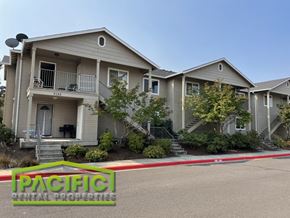 Medford apartment for rent - a house with a red and white ribbon in front of it