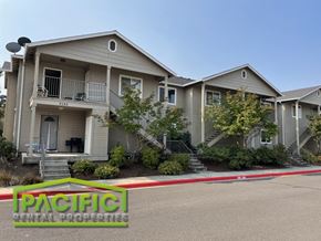 Medford apartment for rent - a house with a red and white ribbon in front of it