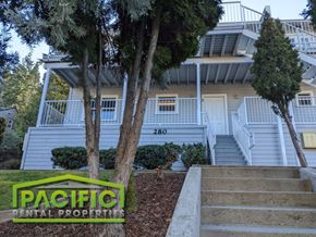 Ashland apartment for rent - a building with stairs and trees in front of it
