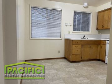 Ashland apartment for rent - a small kitchen with a sink and a window