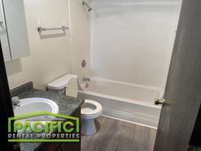 Medford apartment for rent - a bathroom with a toilet and a tub and a sink