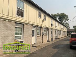 Medford apartment for rent - an old building with a car parked in front of it