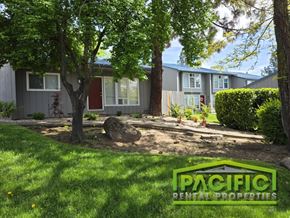 Medford apartment for rent - A sunny day at a residential area with a sign for Pacific Rental Properties.