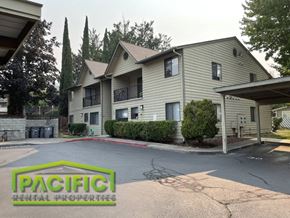 Ashland apartment for rent - a house with a driveway and a parking lot
