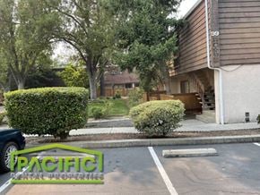 Ashland apartment for rent - an empty parking lot in front of a house