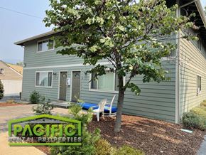 Ashland apartment for rent - a blue house with a tree in front of it