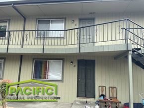 Ashland apartment for rent - a house with a balcony and a sign for pacific nutritional properties