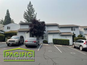 Ashland apartment for rent - an empty parking lot in front of a house