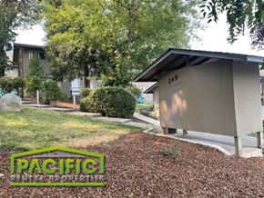 Ashland apartment for rent - a public restroom in a yard in front of a house