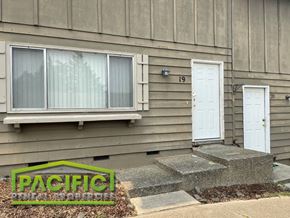 Ashland apartment for rent - the front of a house with a porch and a door