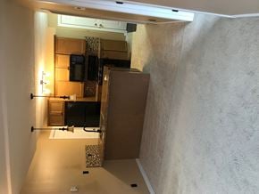Regina condo for rent - a look into the kitchen from the living room