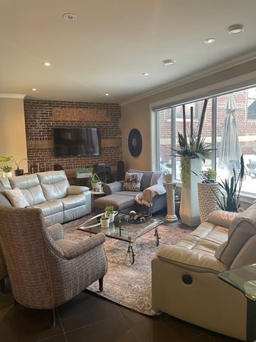Regina condo for rent - A living room with a brown chair and a white couch.