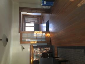 Regina apartment for rent - A room with a wooden ceiling and a window with blinds.