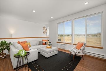 Post Falls apartment for rent - a living room with a couch and a chair
