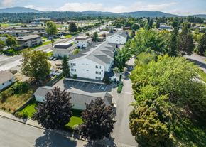 Spokane Valley apartment for rent - an aerial view of a neighborhood with houses and trees