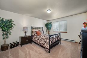 Spokane apartment for rent - a bedroom with a bed and a window