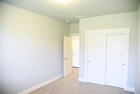 Spokane apartment for rent - a bedroom with white walls and a closet