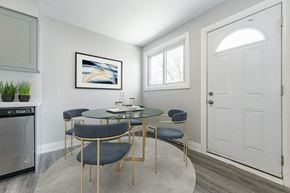 Galt East apartment for rent - a dining room with a glass table and chairs