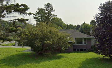 Kingston apartment for rent - a house with a tree in front of it