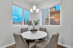 Colorado Springs apartment for rent - A dining room with a white table and chairs.