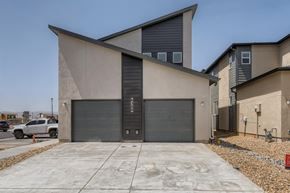 Colorado Springs apartment for rent - the front of a building with two garage doors